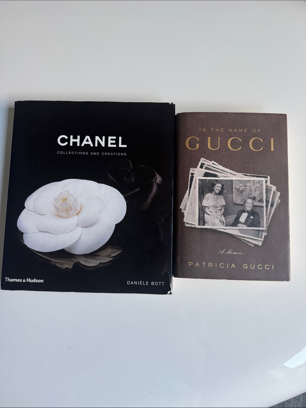 CHANEL Black Cover Coffee Table Book. GUCCI Brown Cover Coffee Table.